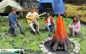 Preview: 500211 - Camper mit Gitarre auf Baumstumpf